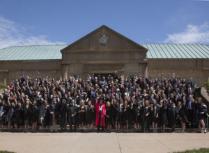 King's class graduation photo on library steps