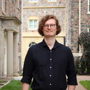 Aaron Wright standing on King's Campus