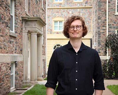 Aaron Wright standing on King's Campus