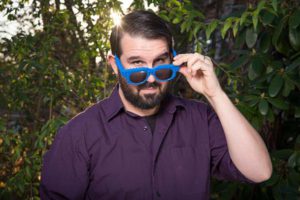 Trevor Murphy, wearing blue sunglasses.