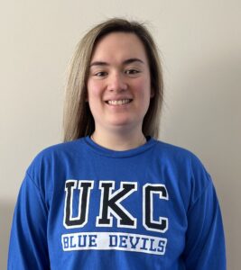 Headshot of DeVilla wearing UKC team shirt