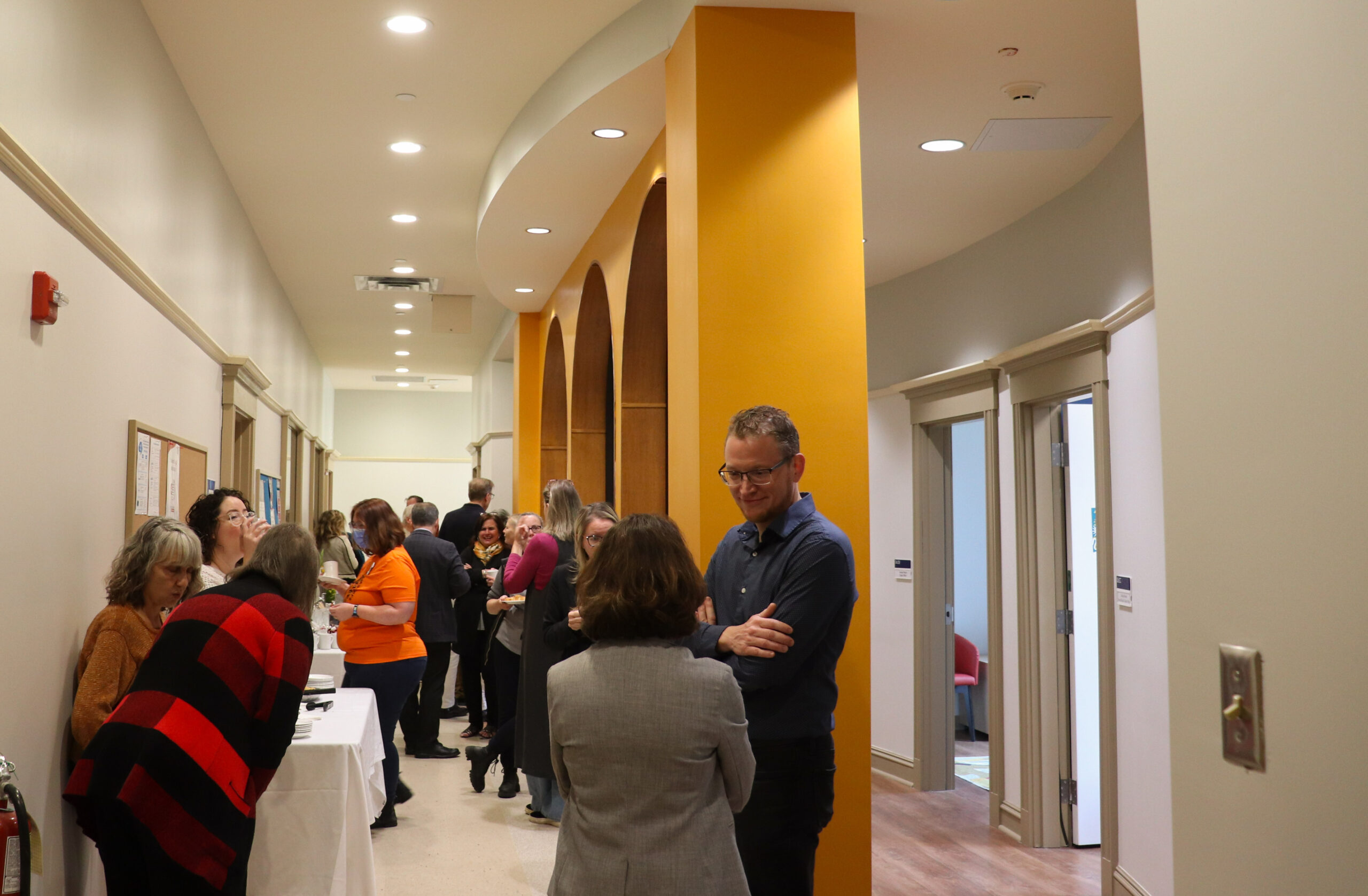 King's staff members mingle in the new Deane Little Community Support Centre.