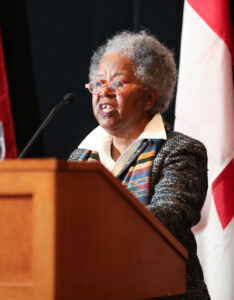 Sylvia Hamilton at podium speaking at the USS Conference