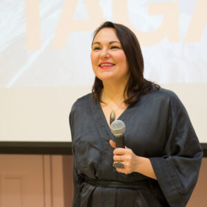 Tanya Tagaq holding mic and speaking at Fountain Memorial Lecture 2017