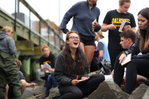 Dal students laughing and talking in a group outside