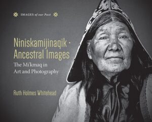 black and white photo of Mi'kmaw Elder in traditional hooded garment