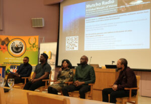 panel sits in alumni hall