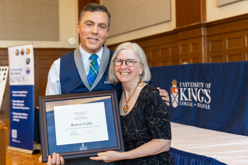 Kim gives Robert his Judge J. Elliott Hudson award